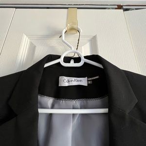 Woman’s black pant suit